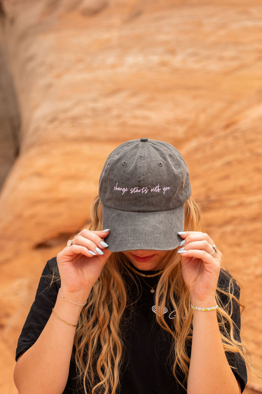 'change starts with you' Adjustable Hat